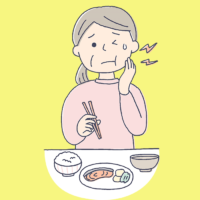 歯が痛くて噛めない高齢女性