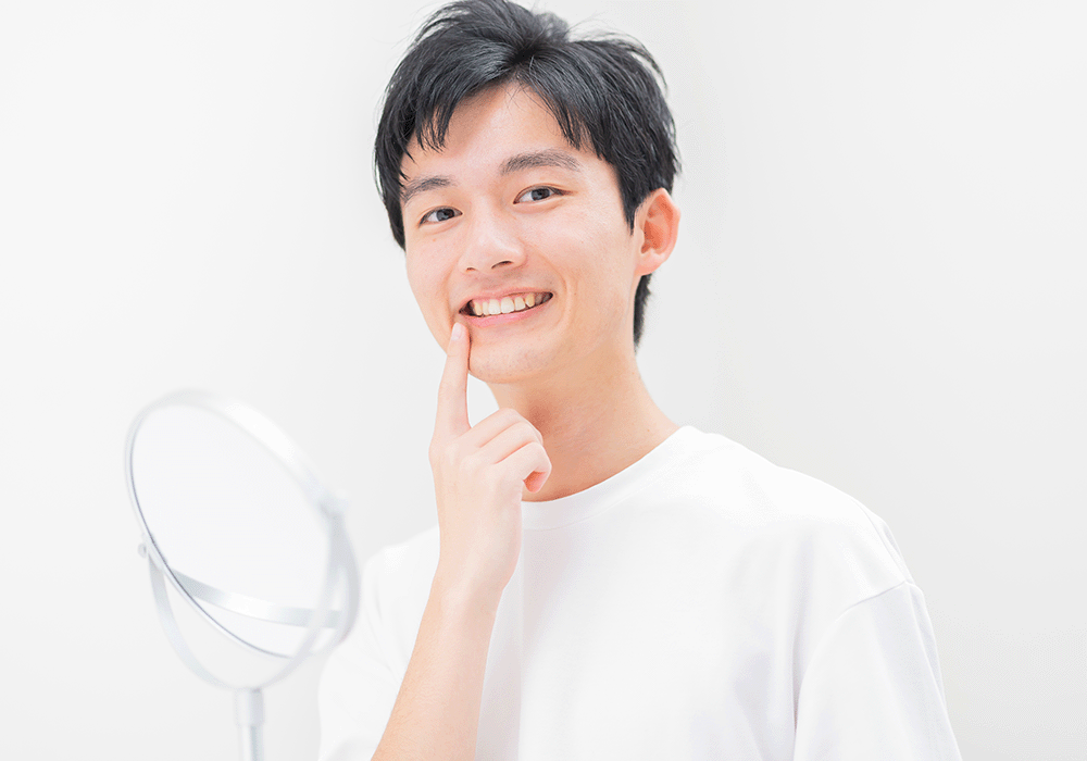 健康な歯の男性