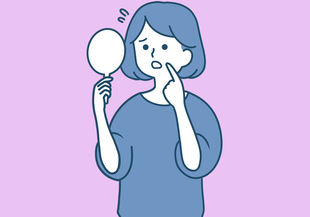 口内炎が気になる女性