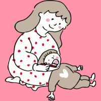 お母さんに仕上げ磨きをしてもらう子供