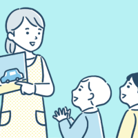 読み聞かせをする女性